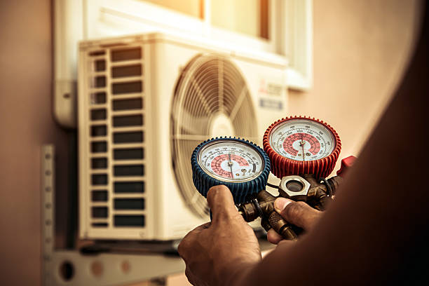 Professional Ductwork Repair technician working in East Walpole, MA